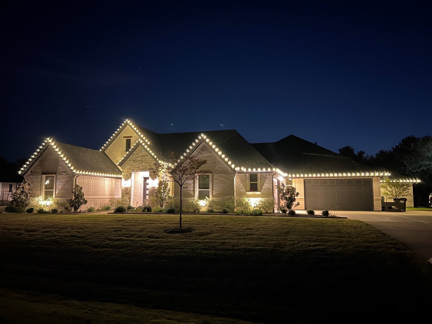 Holiday lighting install by Bright's