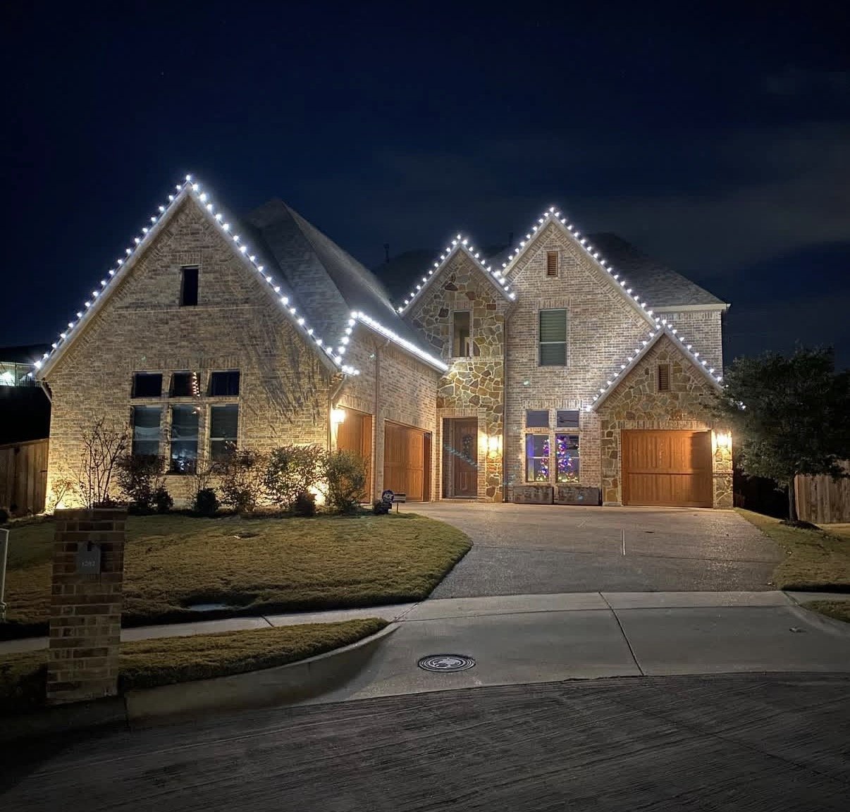 Holiday lighting install by Bright's